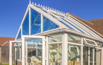 conservatory roof insulation costs Woldingham Garden Village